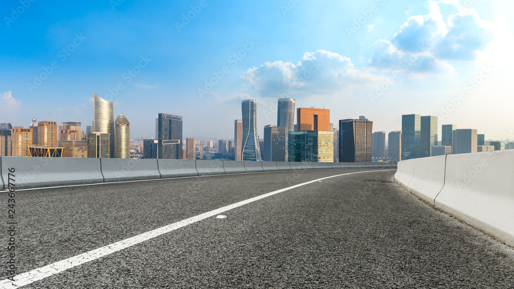 Empty asphalt road and city skyline in hangzhou,high angle view Empty asphalt road and city skyline in hangzhou,high angle view
