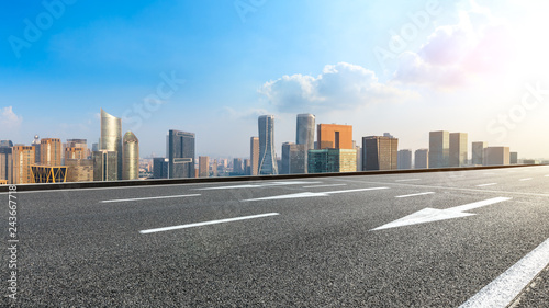 Empty asphalt road and city skyline in hangzhou high angle view