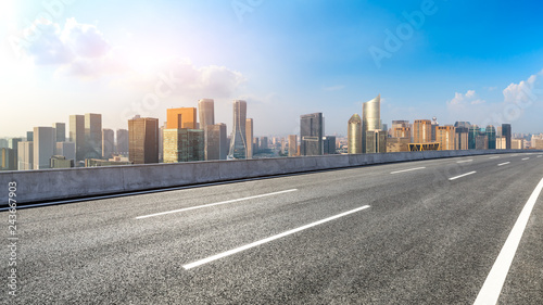 Empty asphalt road and city skyline in hangzhou high angle view