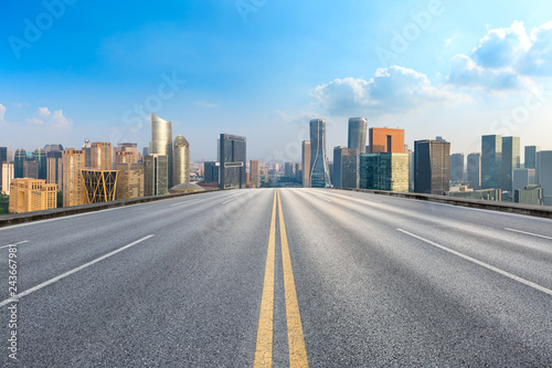 Empty asphalt road and city skyline in hangzhou high angle view