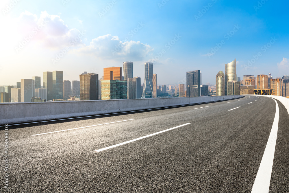 Empty asphalt road and city skyline in hangzhou,high angle view Empty asphalt road and city skyline in hangzhou,high angle view