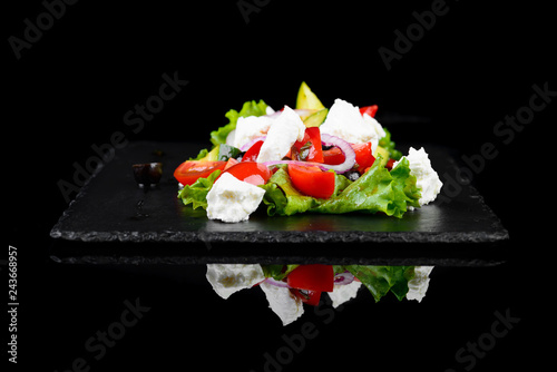 Greek Salad on a black background