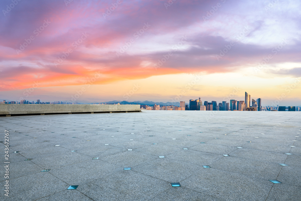 Empty floor and city skyline at sunrise in hangzhou,high angle view