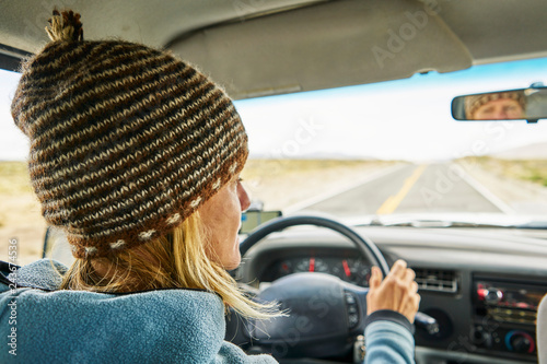 Peru, Arequipa, woman driving car on Panamericana photo