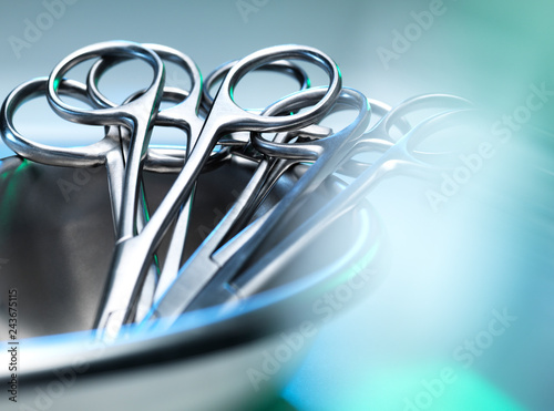 Surgical instruments, surgical scissors in a kidney shaped dish photo