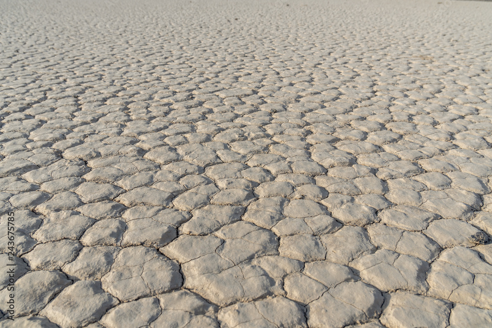 Dry lake bed formed polygon patterns, usually 6 sided, Racetrack Playa, Death Valley National Park, California Dry lake bed formed polygon patterns, usually 6 sided, Racetrack Playa, Death Valley National Park, California
