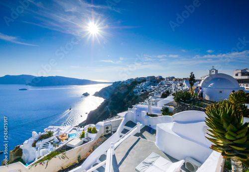 Panoramia of Oia town in Santorini photo