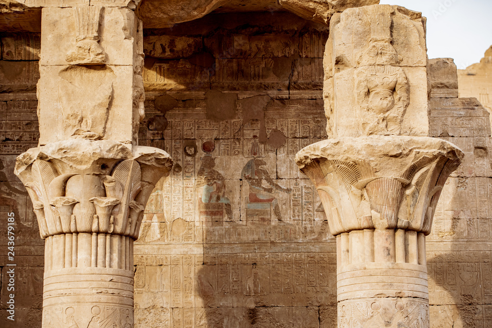 Ancient hieroglyphics still visible in colour on the exterior of Edfu Temple near Luxor Egypt Ancient hieroglyphics still visible in colour on the exterior of Edfu Temple near Luxor Egypt
