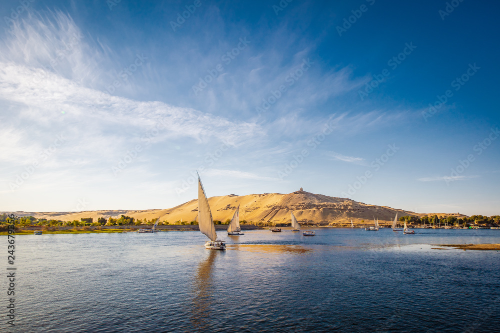 River nile with traditional blats at sunset. Live on the river Nile
