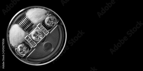 Fotografie black and white, monochrome shot, top view of single micro coil with japanese or