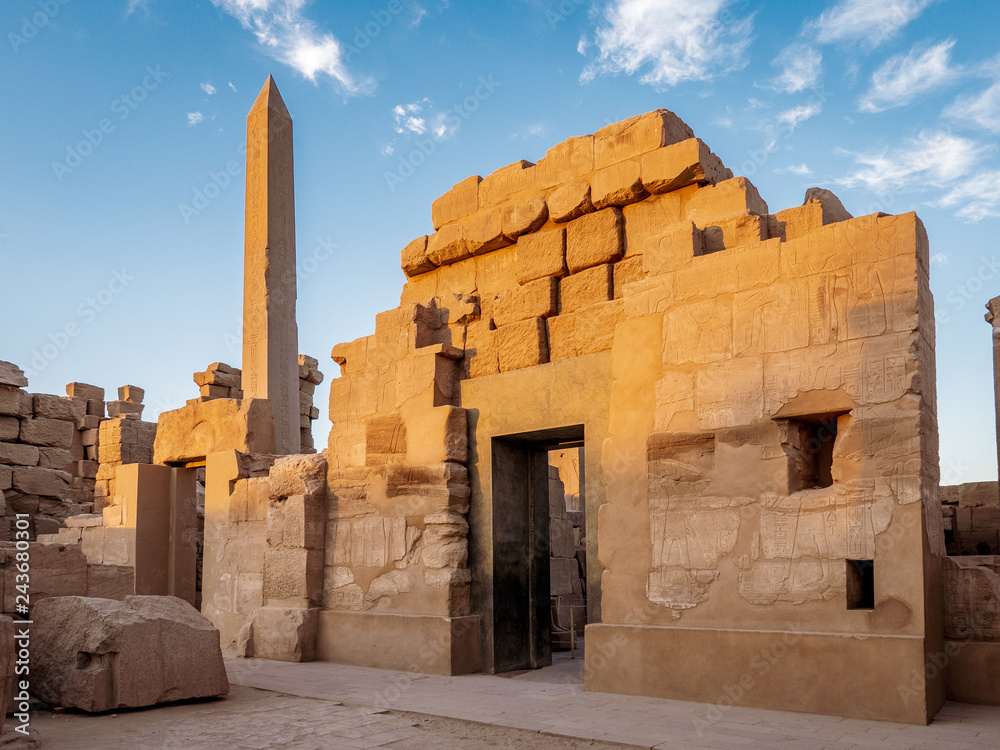 Temple of Karnak known as Karnak in Luxor with the Great Obelisk and ancient hieroglyphics on the stone walls