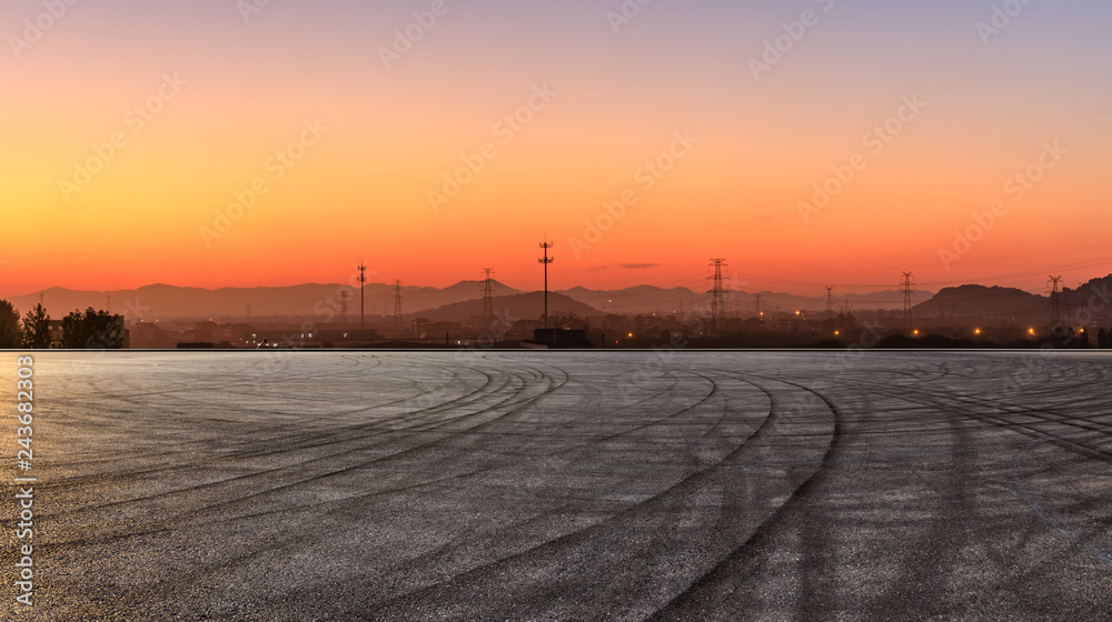 Empty asphalt road and mountains at beautiful sunset,panoramic view