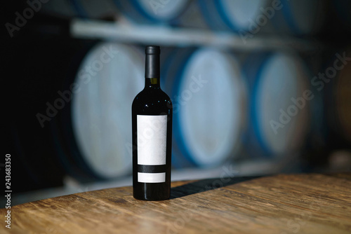 bottle of red wine with white label