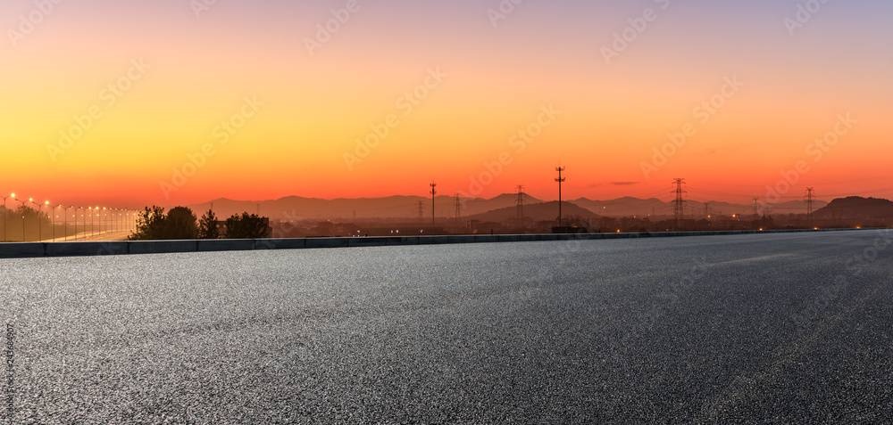 Empty asphalt road and hills at beautiful sunset,panoramic view