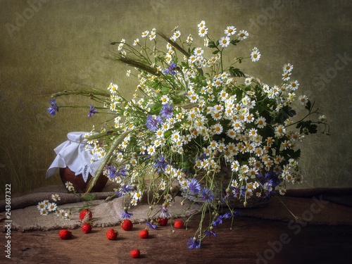 Still life with bouquet of wildflowers photo