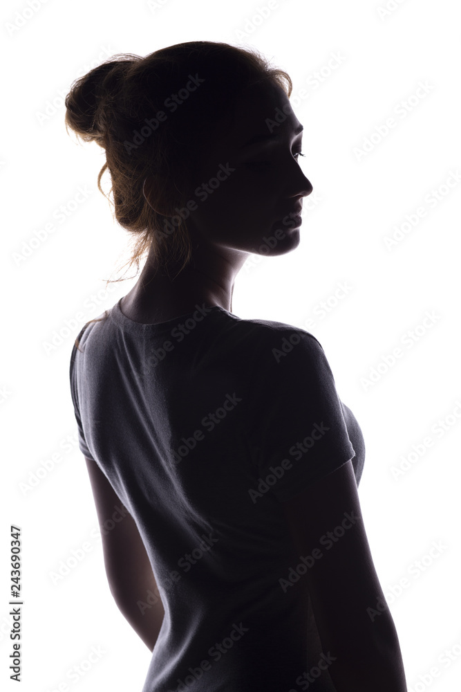 figure of a sensual young woman standing back and turning around, a beautiful girl with hand-picked hair on a white isolated background