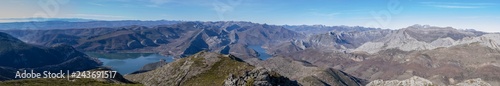 Panoramic photo from the peak pedroso, Leon (Spain), of the Cantabrian mountain range of Leon with the reservoir of Barrios de Luna and his cable-stayed bridge.