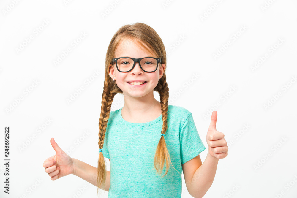 pretty girl with black glasses and plaits in front of white background in the studio pretty girl with black glasses and plaits in front of white background in the studio