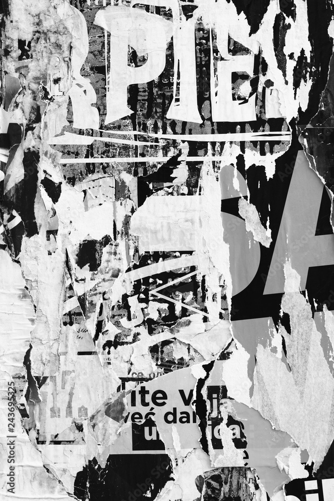 Fototapeta premium Old grunge ripped torn vintage collage posters creased crumpled paper surface texture background backdrop placard advertising