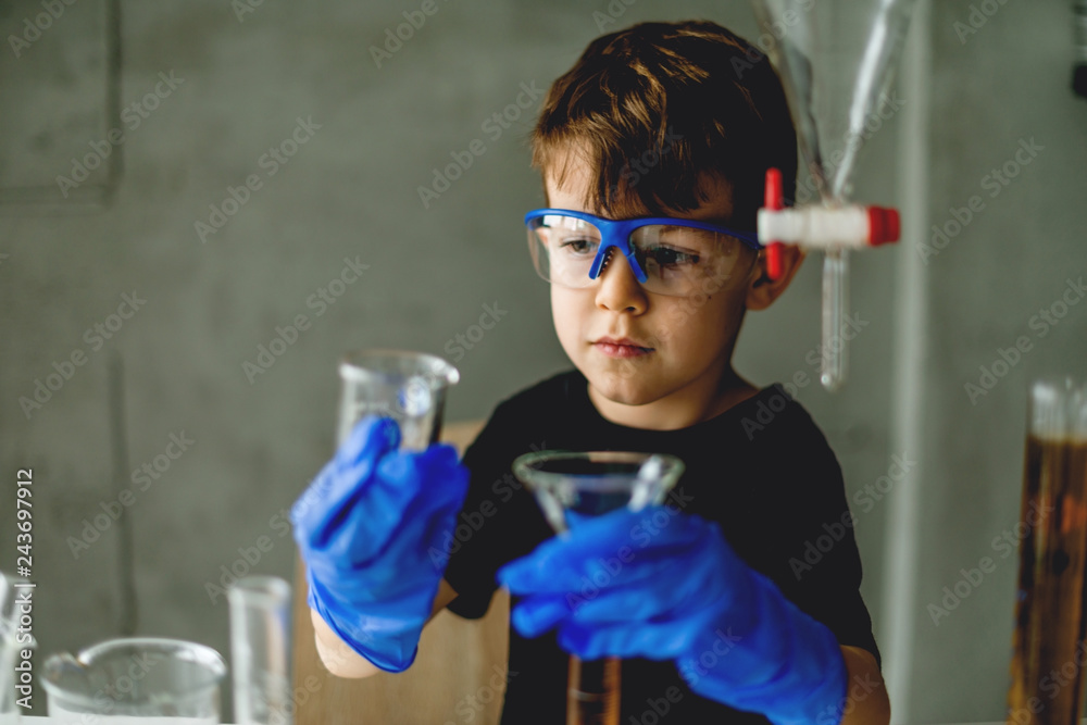 Preschooler scientist in laboratory Preschooler scientist in laboratory