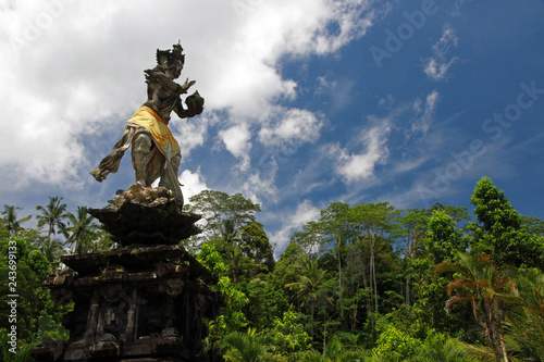 Statue of Hindu God Indra Bringing Holy Water at Tirta Empul temple  Pura Tirta Empul  Hindu Balinese water temple  Tampaksiring  Bali  Indonesia