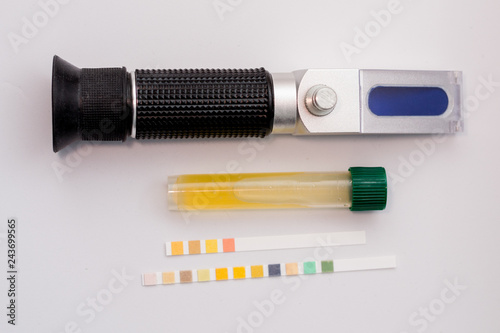 urine sample, refractometer and urinary strips