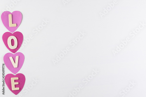 word LOVE in hearts on white background with space for text, Love icon, valentine's day, relationships concept © Ingon