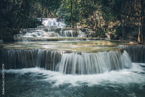 Fototapeta Naklejka Na Ścianę i Meble -  Close up of Huay Maekamin Waterfall Tier 1 (Dong Wan or Herb Jungle) in Kanchanaburi, Thailand; photo by long exposure with slow speed shutter