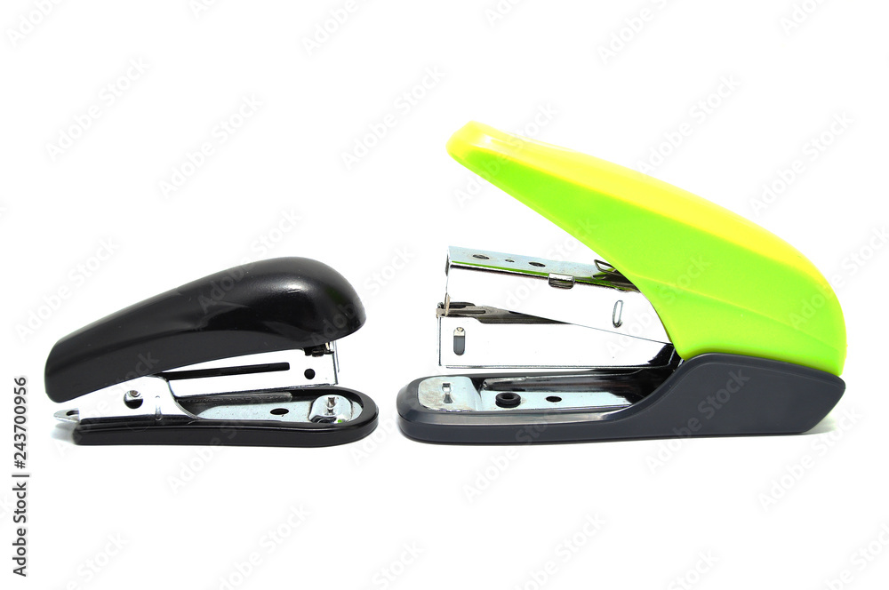 Stapler on a white background close-up. Office, stationery, item Stapler on a white background close-up. Office, stationery, item