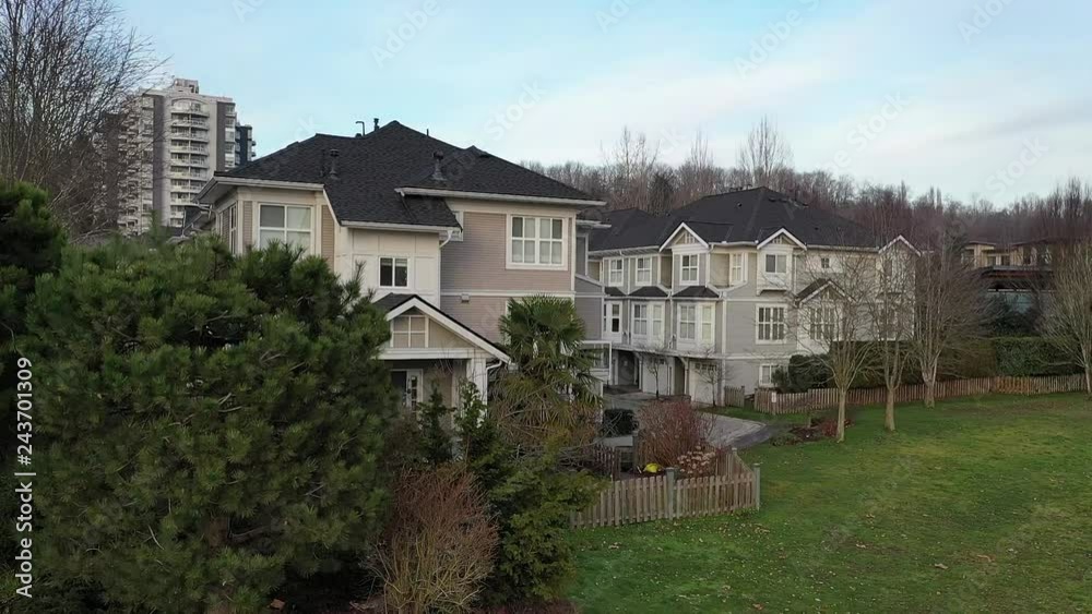 A perfect neighbourhood. Houses in suburb at Summer in the north America. Luxury houses with nice landscape. Aerial drone view. 4K. A perfect neighbourhood. Houses in suburb at Summer in the north America. Luxury houses with nice landscape. Aerial drone view. 4K.