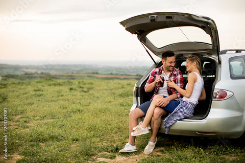 Loving couple sitting in th...