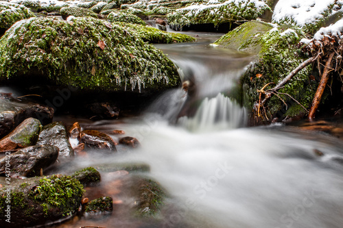 cascade in winter forest