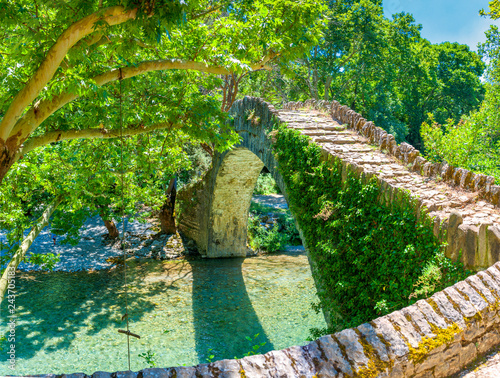 View of the old stone bridge Noutsos located in central Greece, Zagori, Europe photo