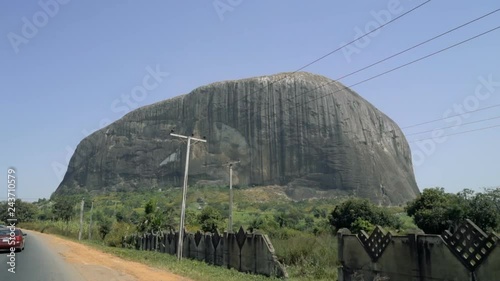 Travel to Zuma Rock mountain driving on the highway in Abuja, Nigeria photo