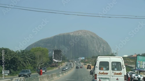 Travel to Zuma Rock mountain driving on the highway in Abuja, Nigeria photo