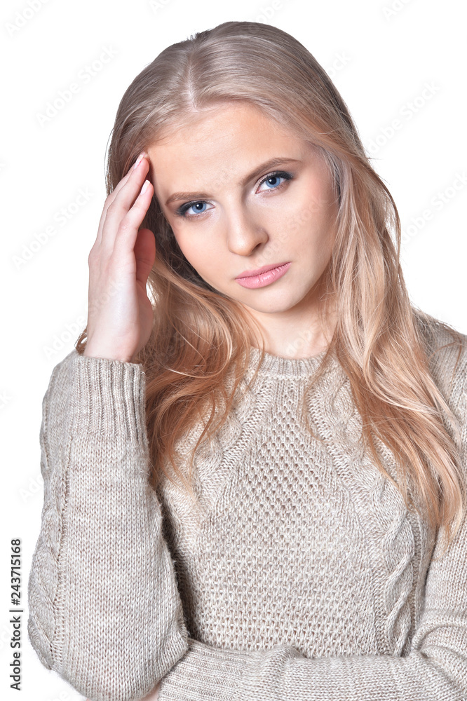 Portrait of young woman with headache isolated on white backgrou Portrait of young woman with headache isolated on white backgrou