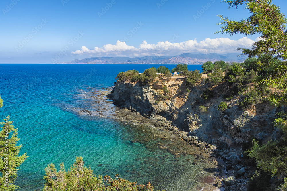 Baths of Aphrodite sea view with blue sky and sea, Cyprus