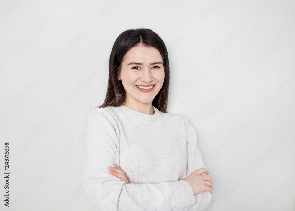 Portrait of young beautiful cute cheerful girl smiling looking at camera over white background. Portrait of young beautiful cute cheerful girl smiling looking at camera over white background.