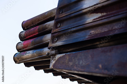 Missile firing system on military armored truck close up view. Rocket launcher closeup. photo