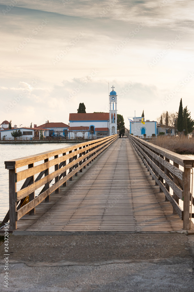 Wooden bridge leading to Saint Nicholas monastery in Porto Lagos, Xanthi, Greece