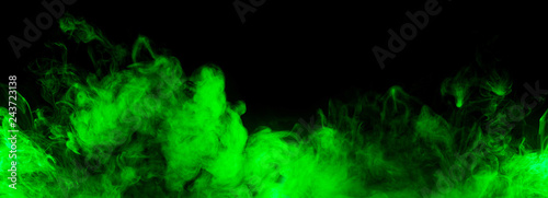 green smoke along black background