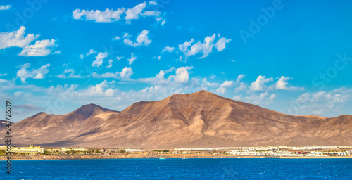 The view from sea at Incredible hills of volcanic island Lanzarote.