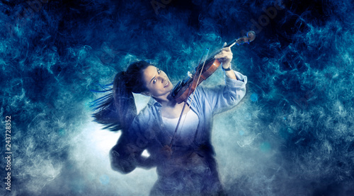 Woman playing violin © Andrey Burmakin
