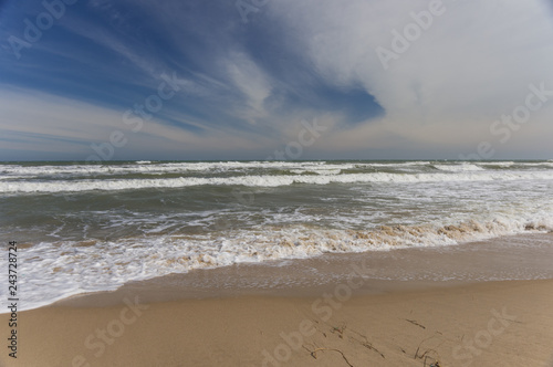 Windy day on sandy beach in Mui Ne, Vietnam