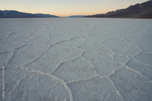 Badwater Basin at sunset in Death Valley National Park, California.