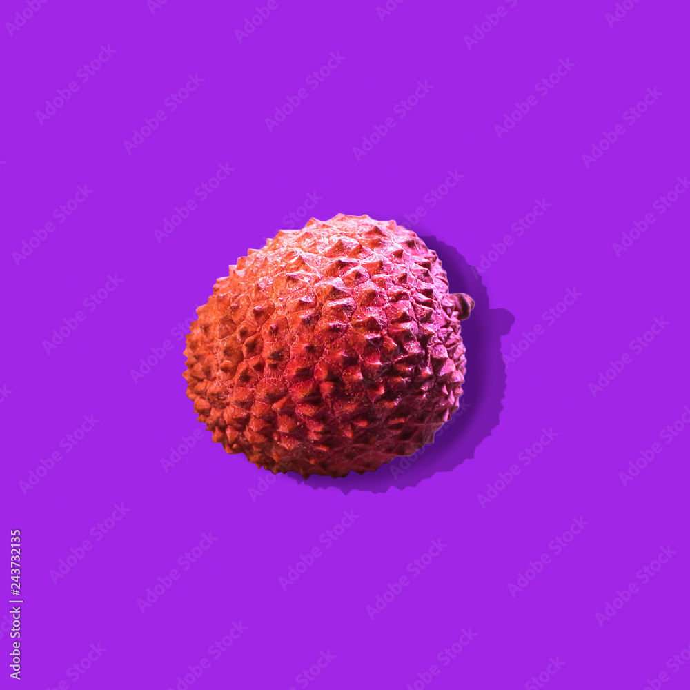 Lychee isolated on a proton purple background. Tropical fruits concept. Lychee isolated on a proton purple background. Tropical fruits concept.