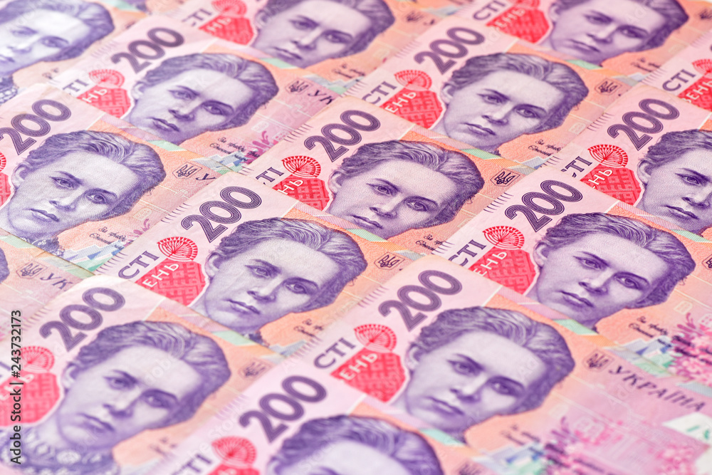 Obraz premium Money and banking.Ukrainian money. Texture from banknotes.