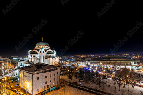 Belgrade, Serbia - January 14, 2019: Orthodox Church Saint Sava and National Library of Serbia by night