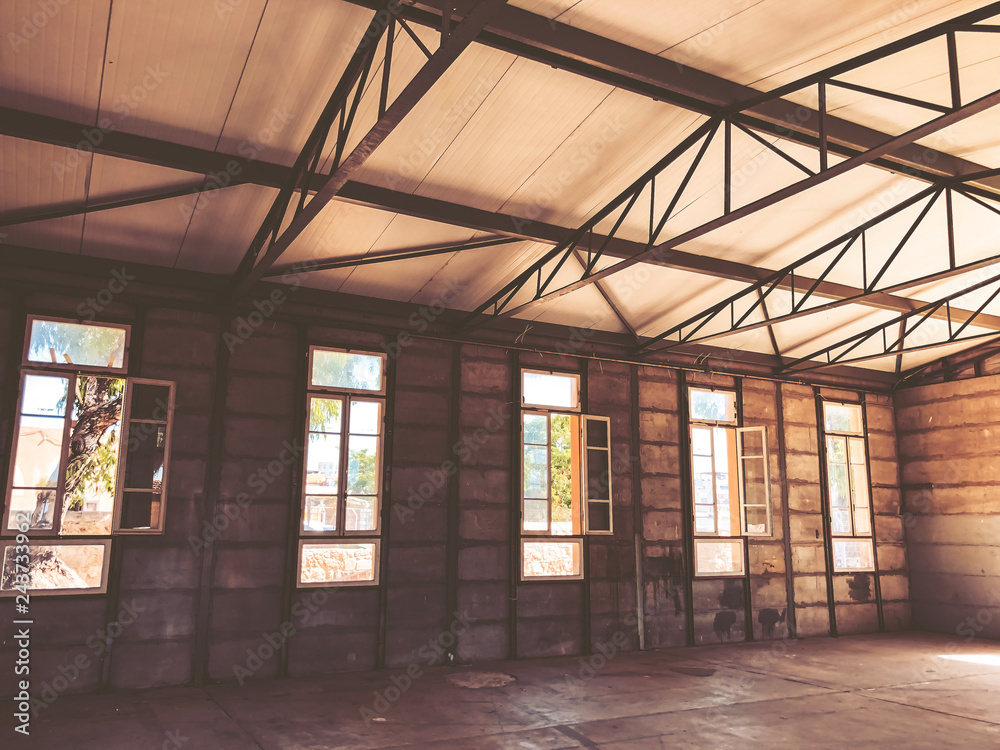 Windows in the unfinished house. Building a house on a sunny day