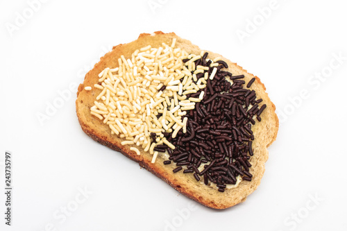 Delicious natural looking toast with Dutch chocolate sprinkles on isolated white background